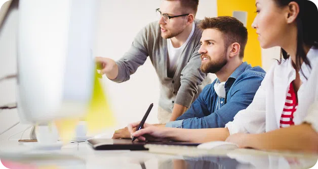 People working in an office on computers