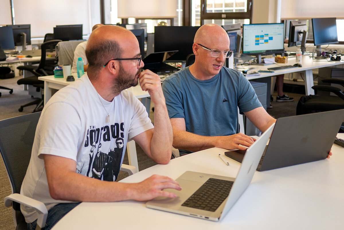 Developer and Designer discussing work