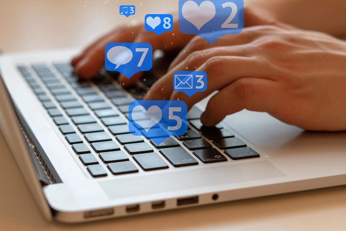 Laptop with heart emojis