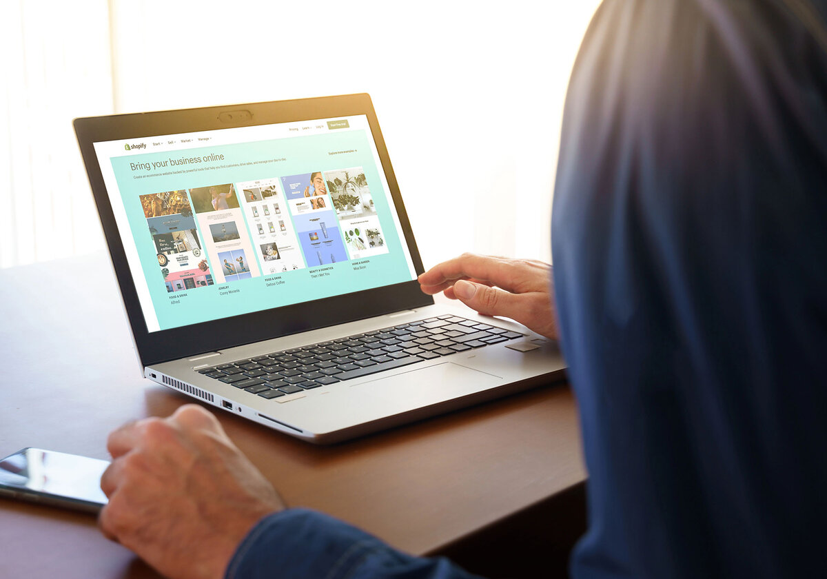 Shopify web page displayed on a modern laptop