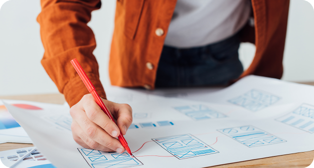 Person drawing a flow chart with felt tip