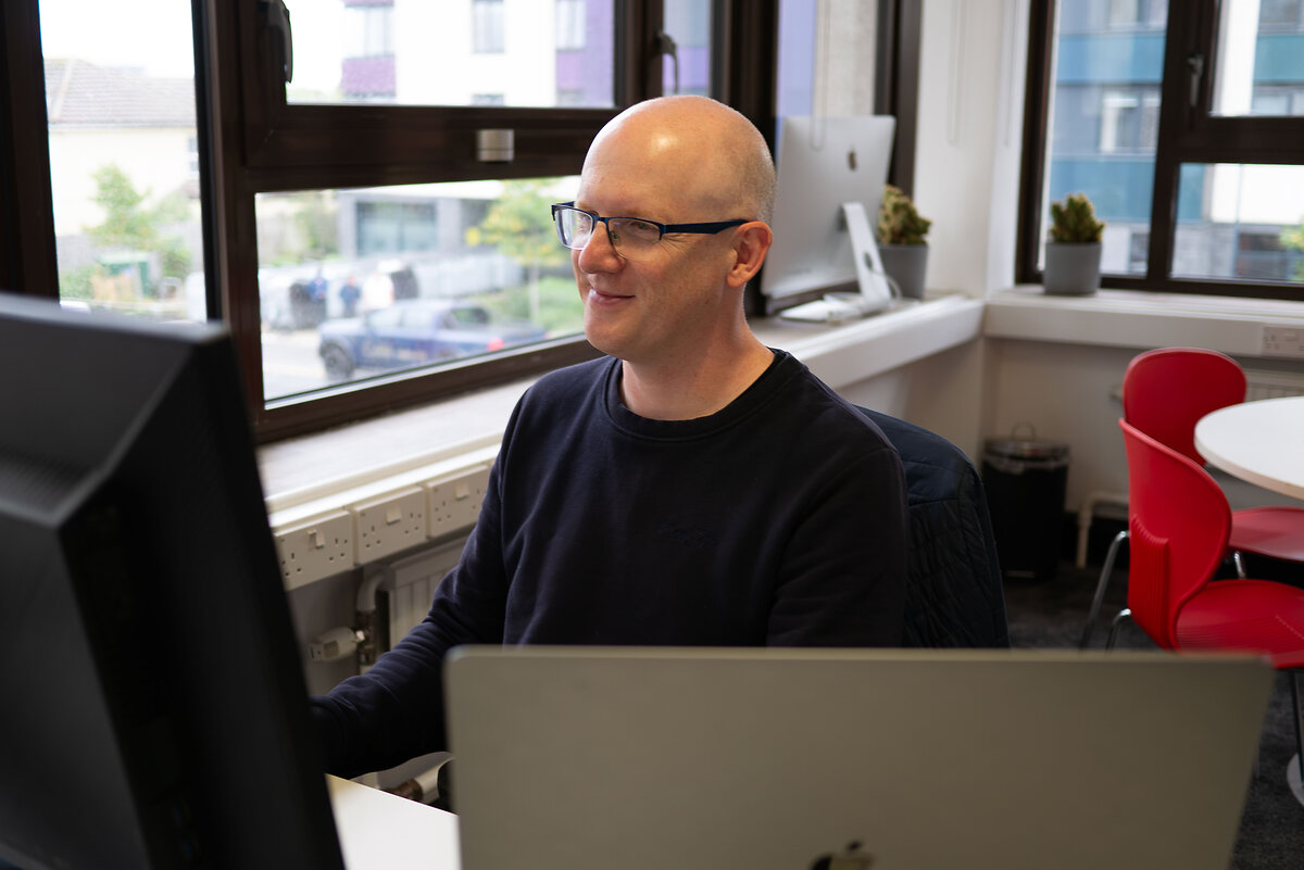 Man looking at monitor
