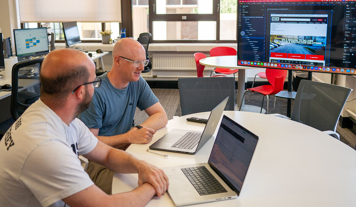 Developer and Designer discussing work
