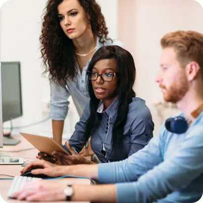 Team working in office with a computer