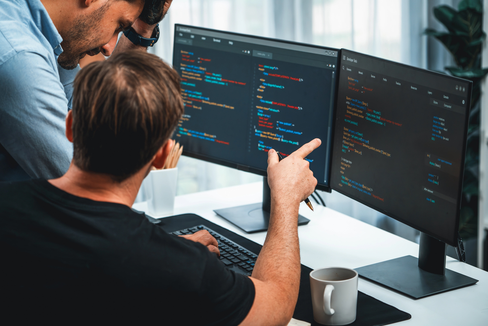 Developers discussing code